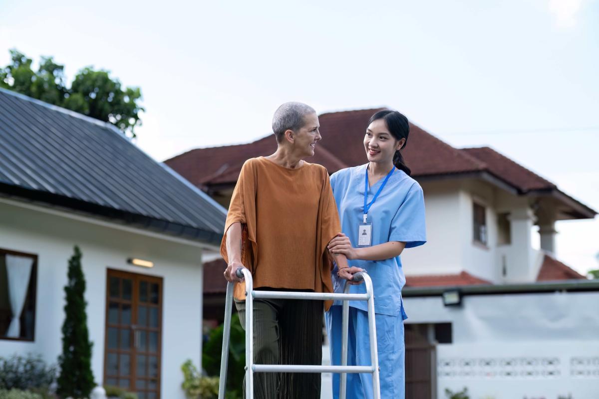 nurse-or-caregiver-hand-on-walking