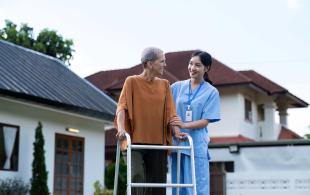 nurse-or-caregiver-hand-on-walking